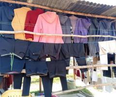 Black trousers and sweaters